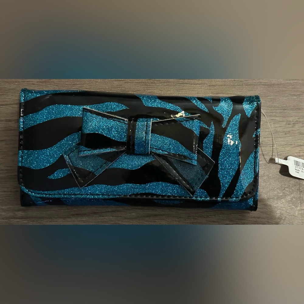Claire’s Wallet black & blue animal print NWT.